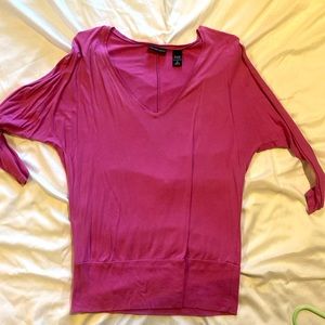 Dolman style blouse with v neckline and banded hip